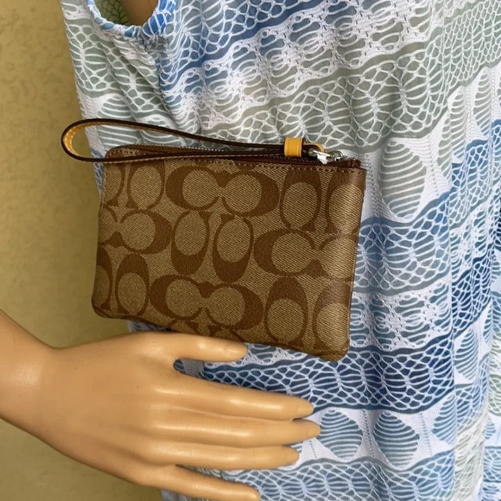COACH Signature PVC Leather Corner Zip Wristlet